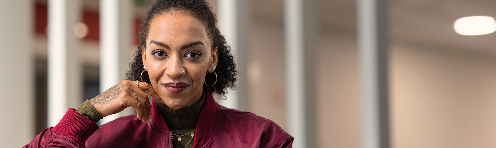 Carlotta, Telefonserviceberaterin in der Agentur für Arbeit Neumünster